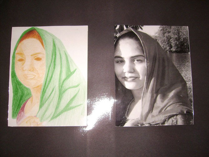 Self-portrait using coloured pencil techniques and the digital photo it was created from