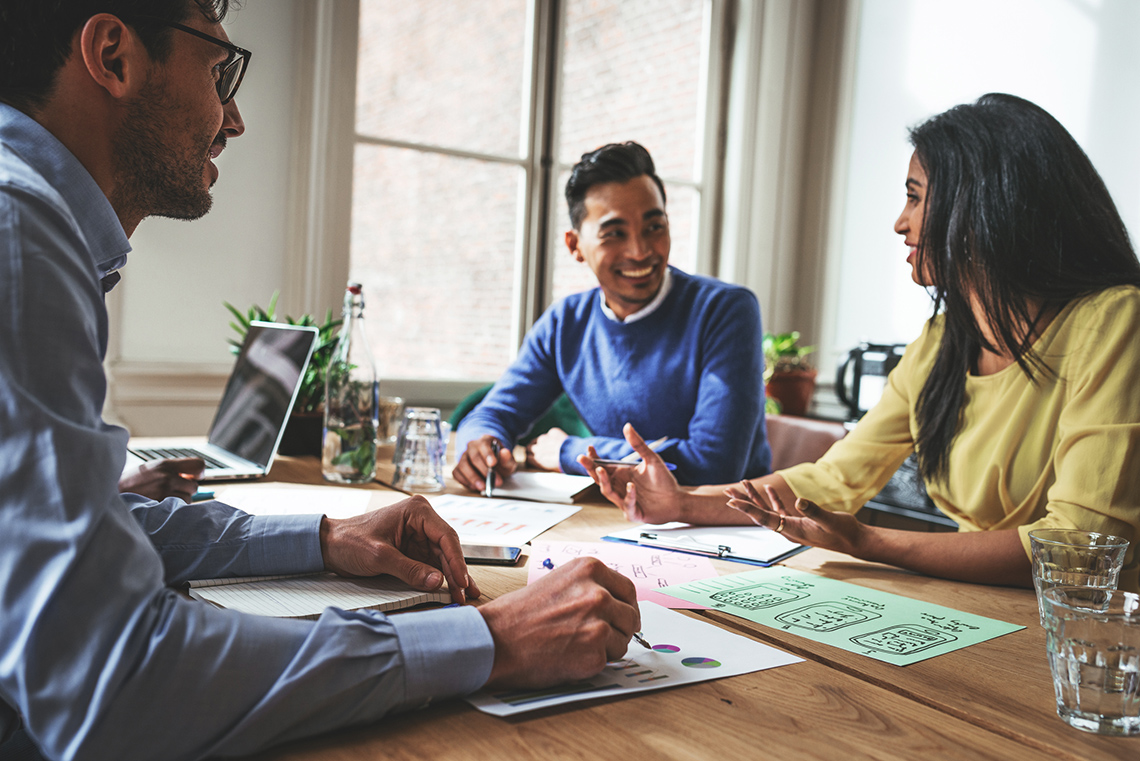 Young investors developing a budget for project