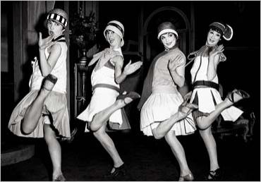 Four flappers dancing the Charleston