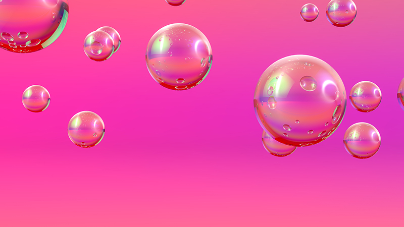Various pink atoms of various sizes floating around.