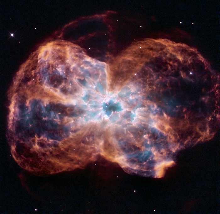 Planetary nebula cloud is lit from the inside by the light from the white dwarf star