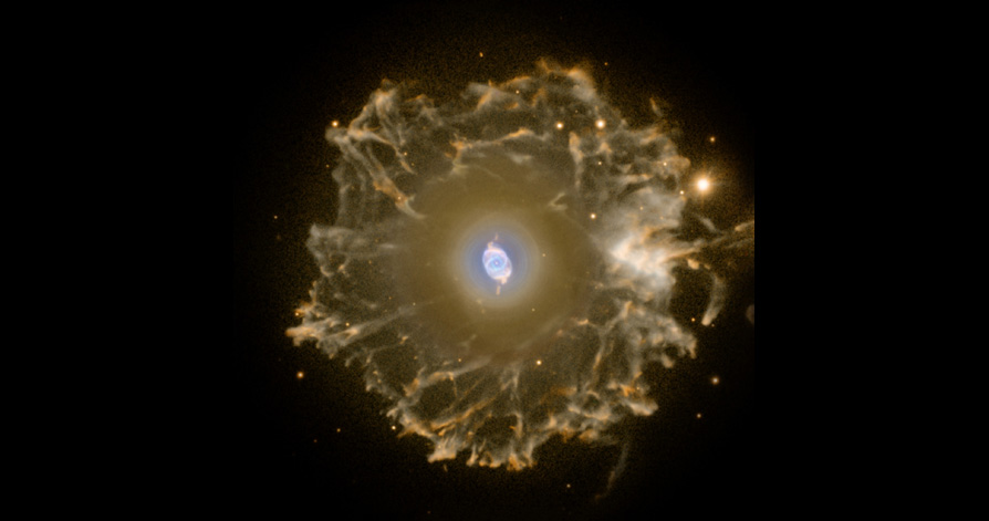 Cat's eye nebula: glowing clouds around a dying star