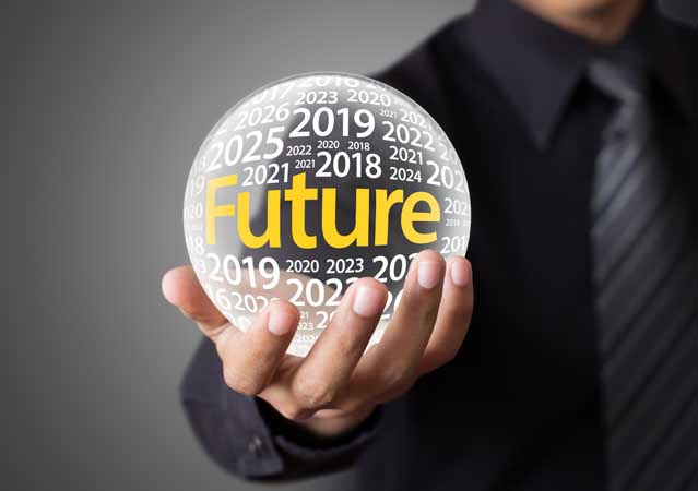 A person holding a ball with the word future