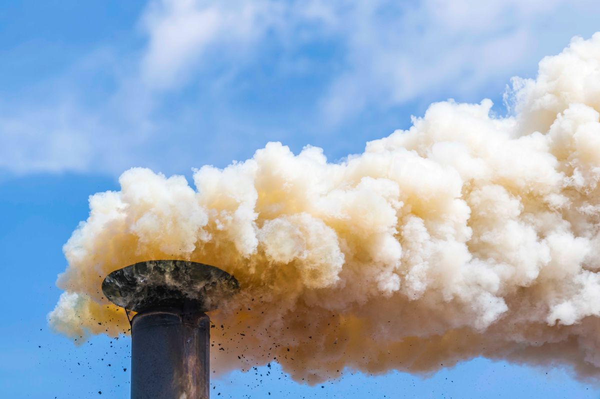 Heavy smoke from an oil refinery chimney