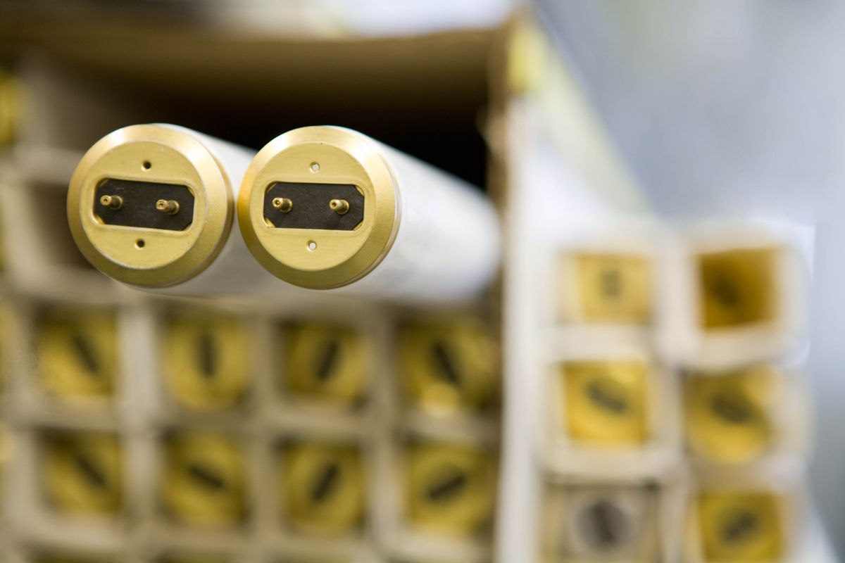 Fluorescent Light Bulbs stacked.